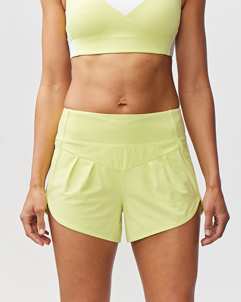 Women's high-rise Sheva running shorts in a body-skimming fit with pleated detail and zip side pocket