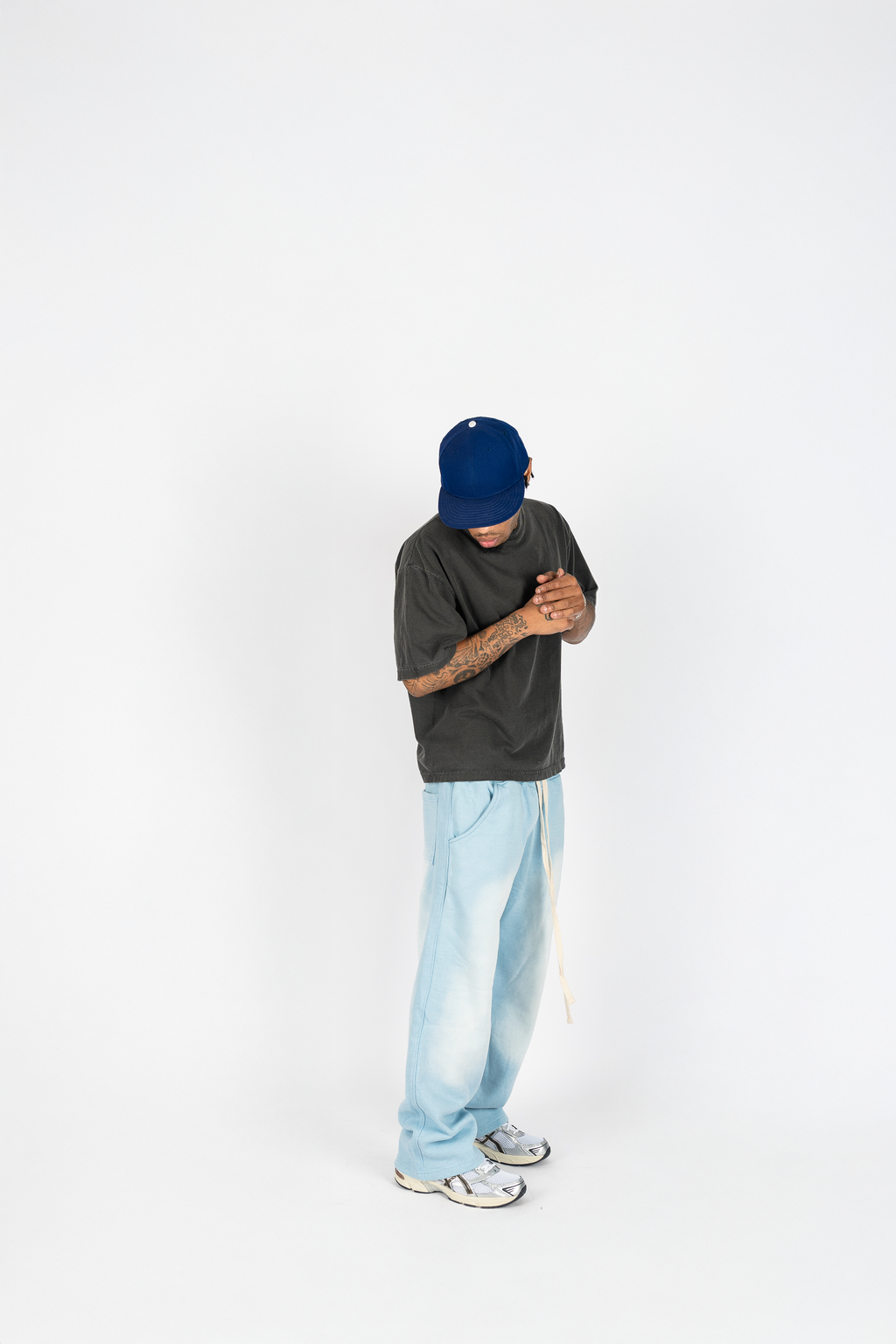 KTL Studios sun-dried bleached heavyweight cotton sweatpants with elastic waistband and outer drawstring, worn by male model