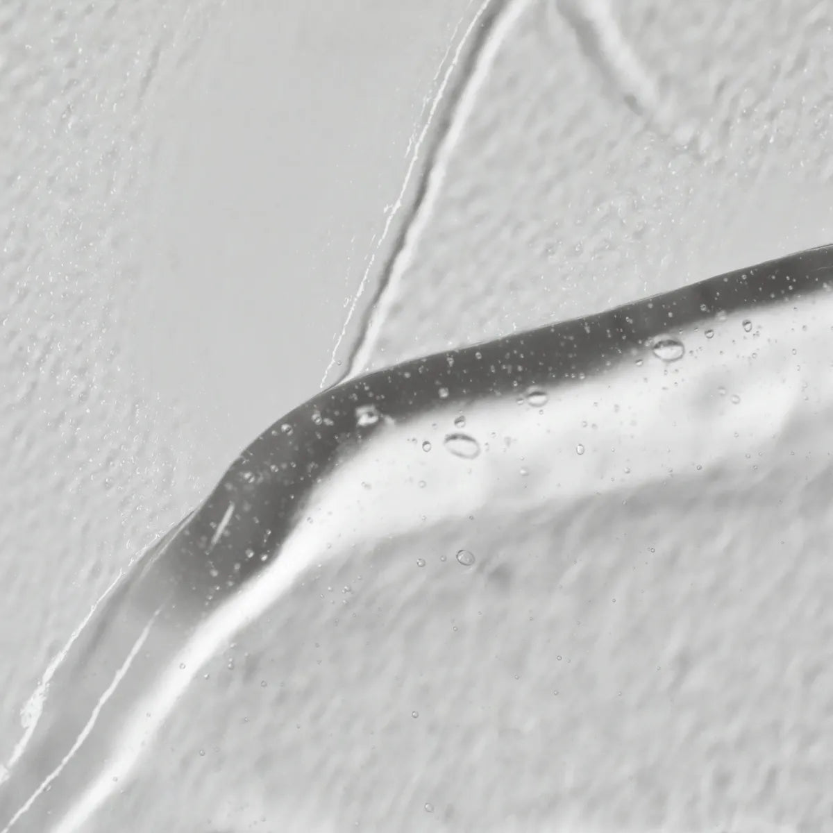 Solawave LightBoost Wand Activating Serum gel tube on a clean surface, brightening skincare treatment