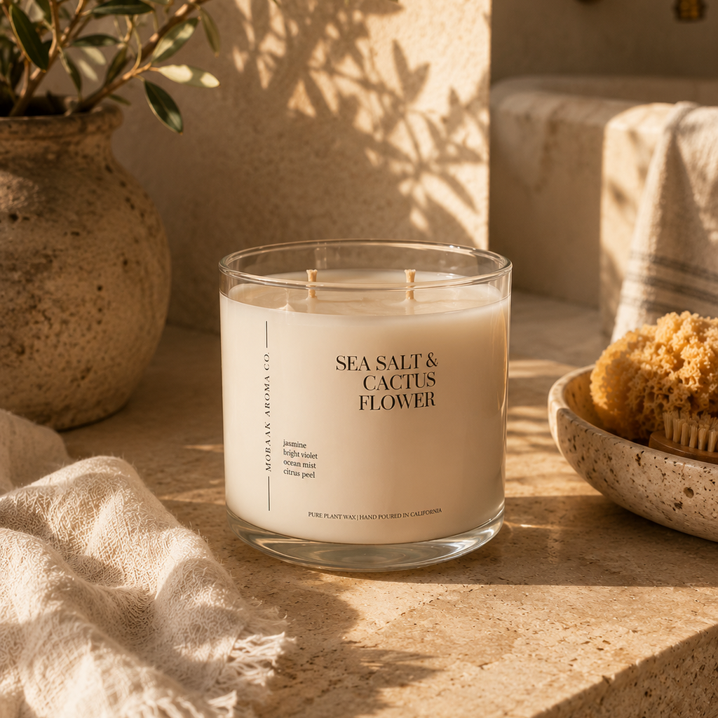 Mobaak Sea Salt and Cactus Flower hand-poured candle in a clean white vessel on a minimal surface