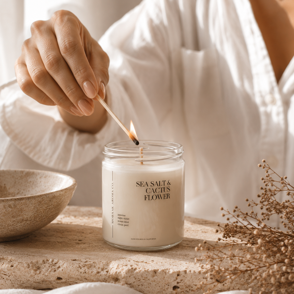 Mobaak Sea Salt and Cactus Flower hand-poured candle in a clean white vessel on a minimal surface