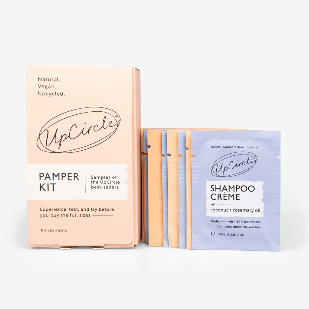UpCircle Pamper + Gift skincare kit with sample-size face and hair care products and a $20 gift card