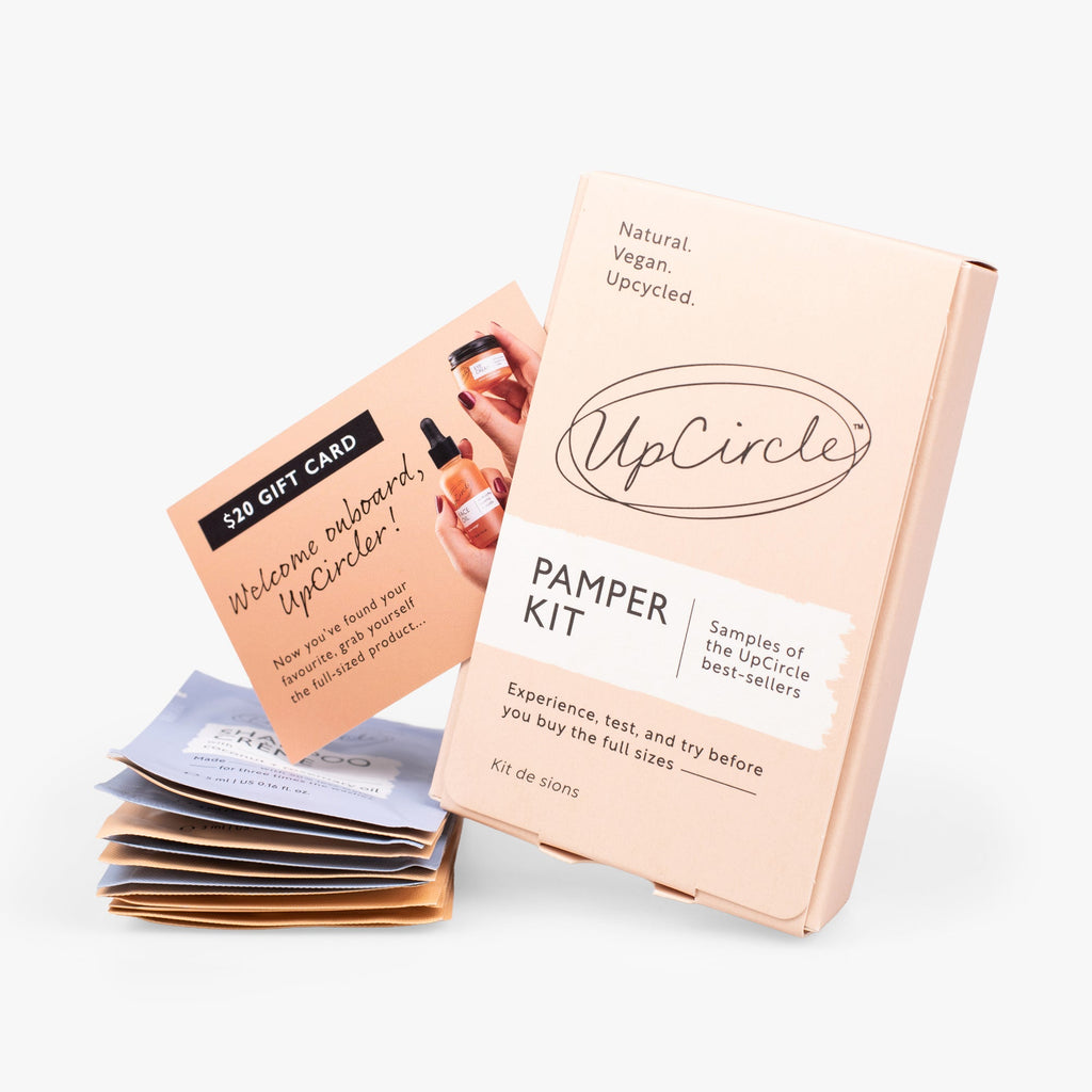 UpCircle Pamper + Gift skincare kit with sample-size face and hair care products and a $20 gift card