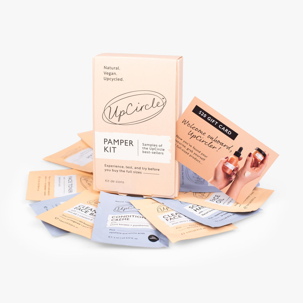 UpCircle Pamper + Gift skincare kit with sample-size face and hair care products and a $20 gift card