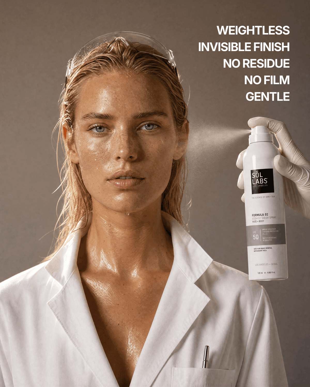Sol Labs Ecomist Sheer Spray Mineral SPF 50 Face + Body Continuous Mist in a clear plastic bottle with a fine misting nozzle