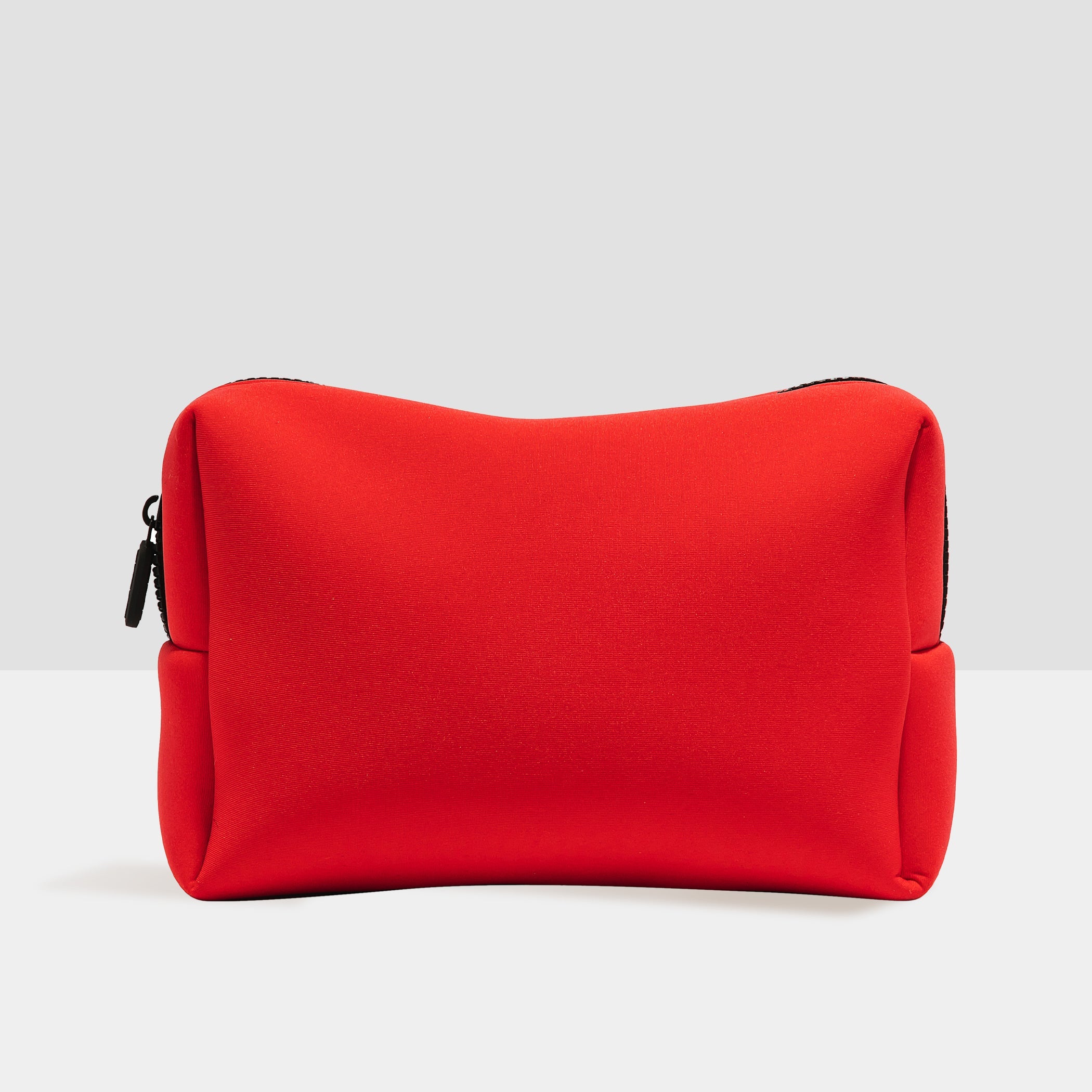 Duradry neoprene travel bag in compact grab-and-go size, lightweight and flexible for travel organization