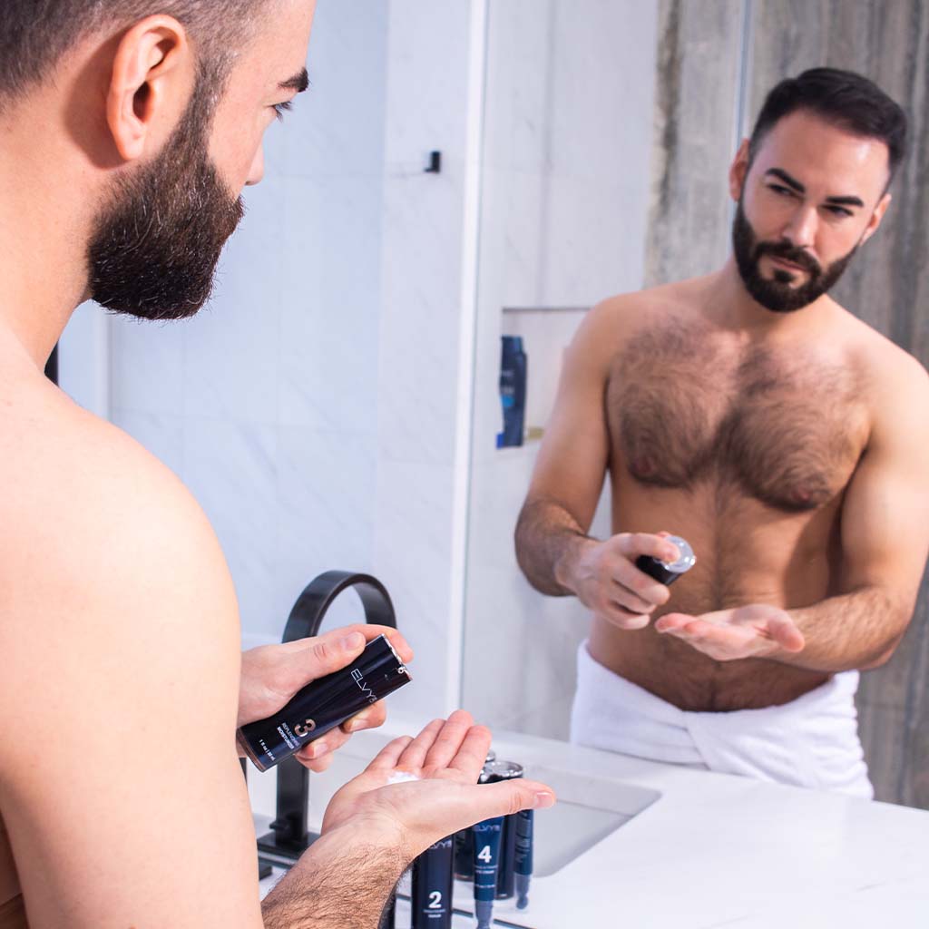 ELVY Lab The Regimen four-step men's daily skincare system kit with numbered products arranged in order