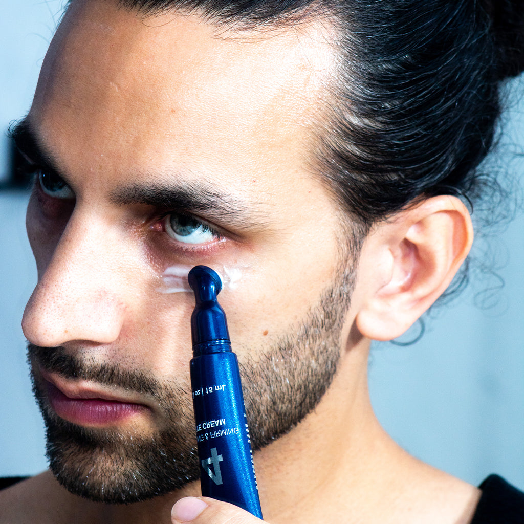 ELVY Lab The Regimen four-step men's daily skincare system kit with numbered products arranged in order