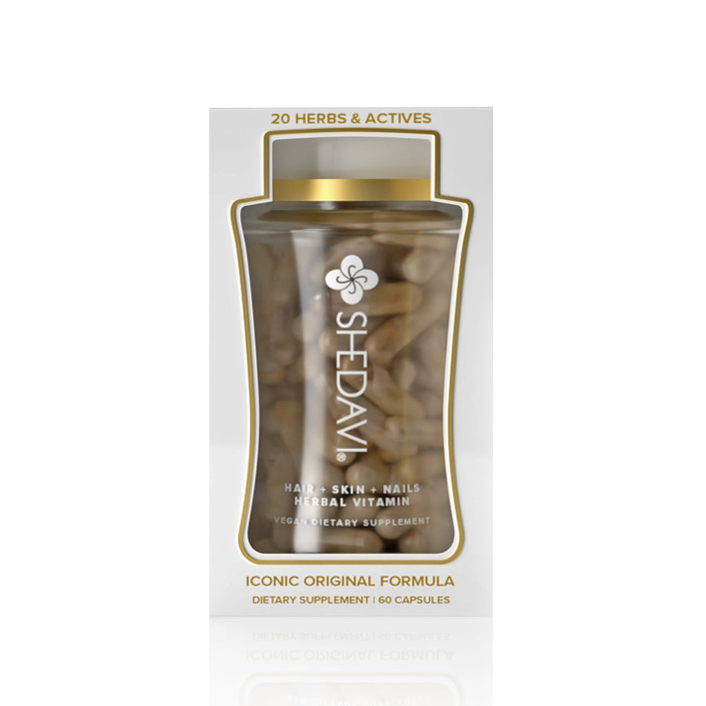 Shedavi herbal hair growth vitamin bottle with botanical ingredients on a clean neutral background