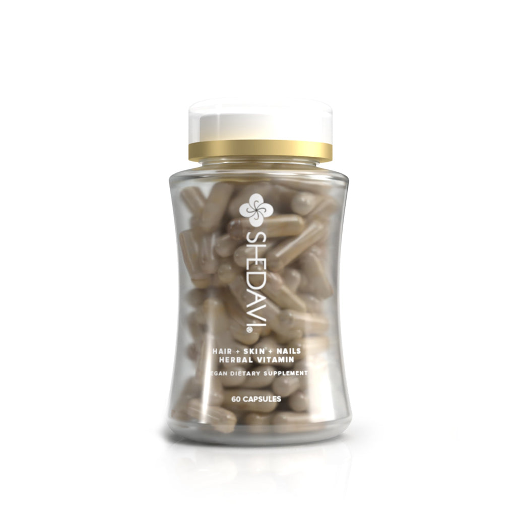 Shedavi herbal hair growth vitamin bottle with botanical ingredients on a clean neutral background