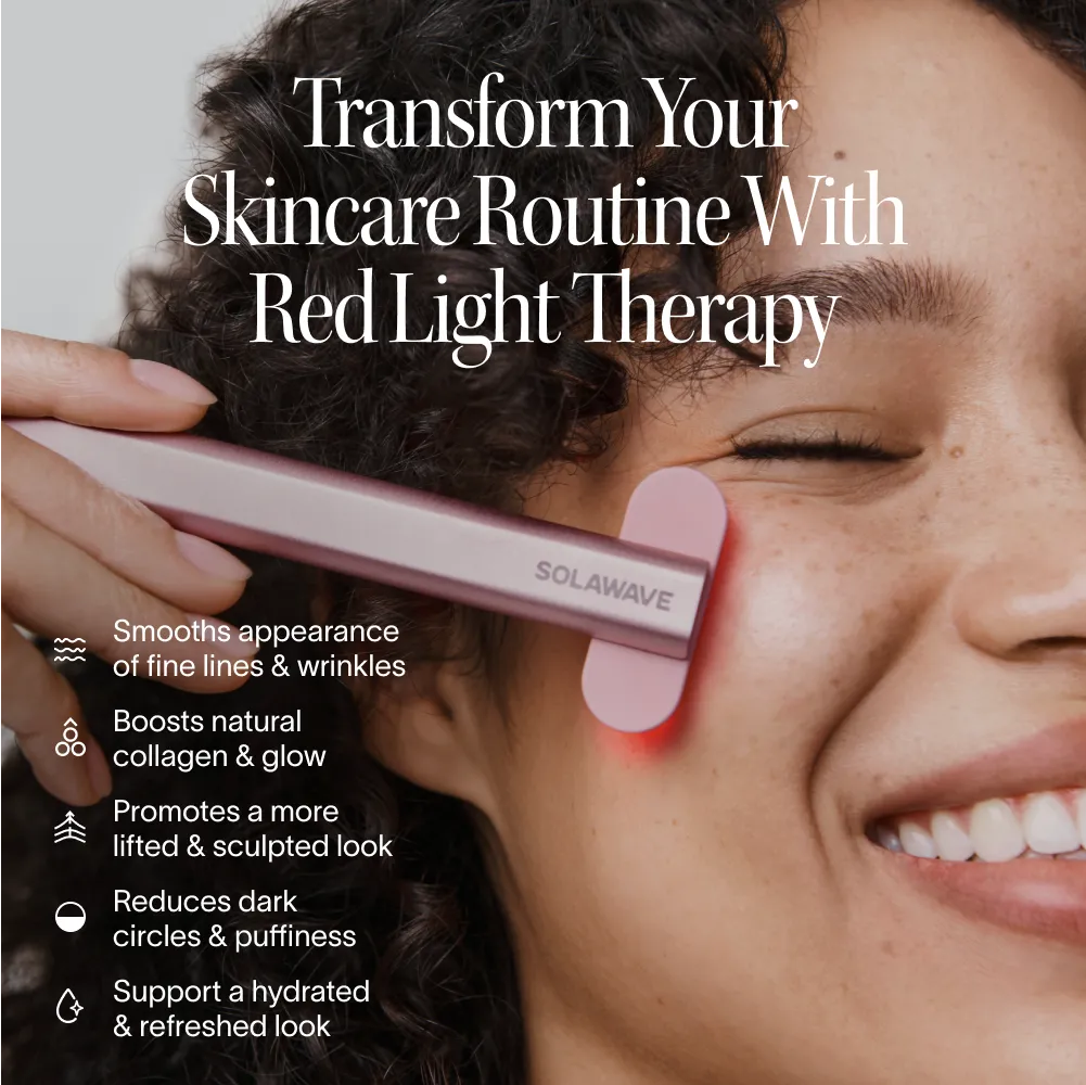 Solawave 4-in-1 red light therapy wand in rose gold next to LightBoost Activating Serum on a clean skincare flat lay