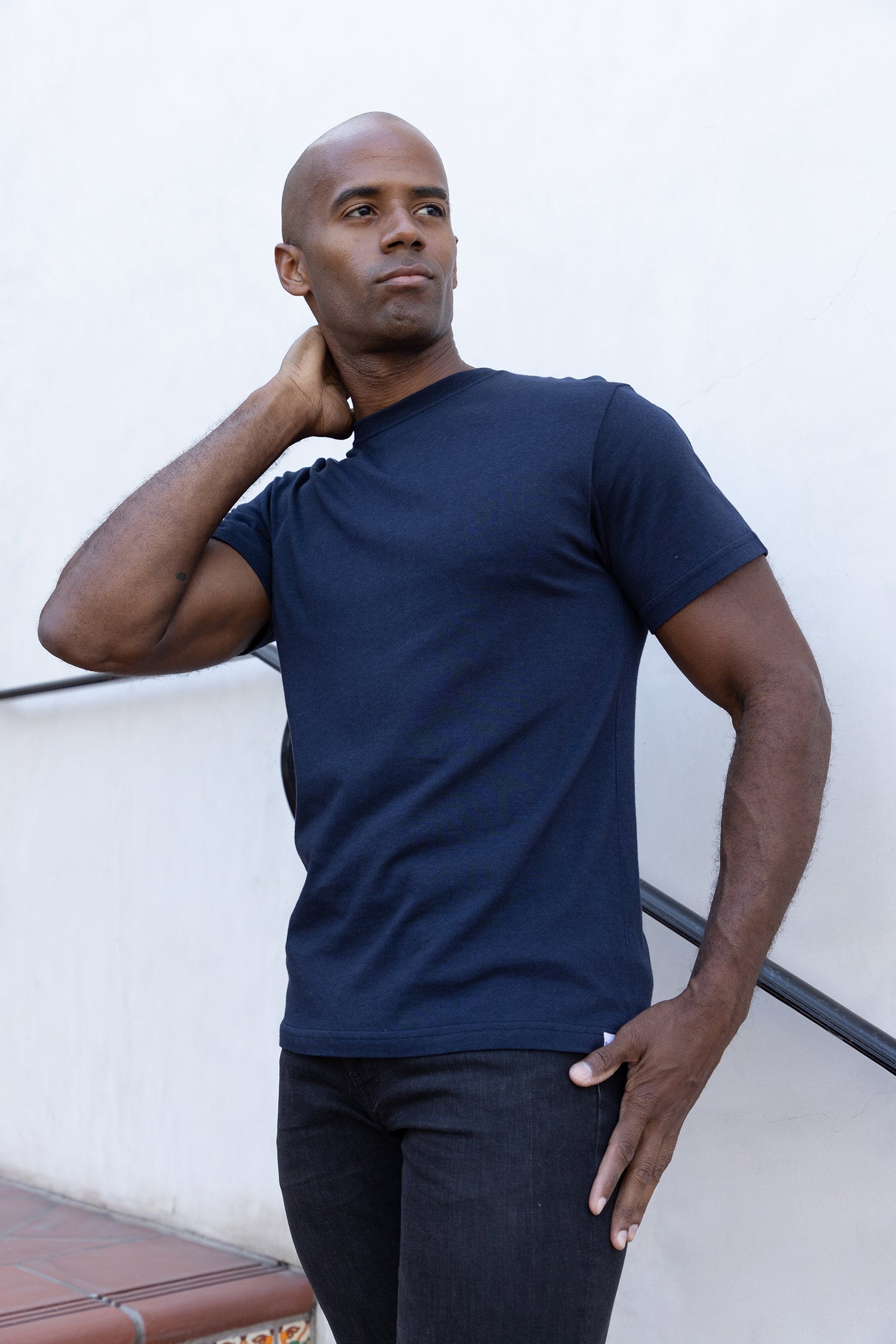 Men's bamboo viscose organic cotton crew neck t-shirt in charcoal grey, classic straight cut, laid flat on neutral background