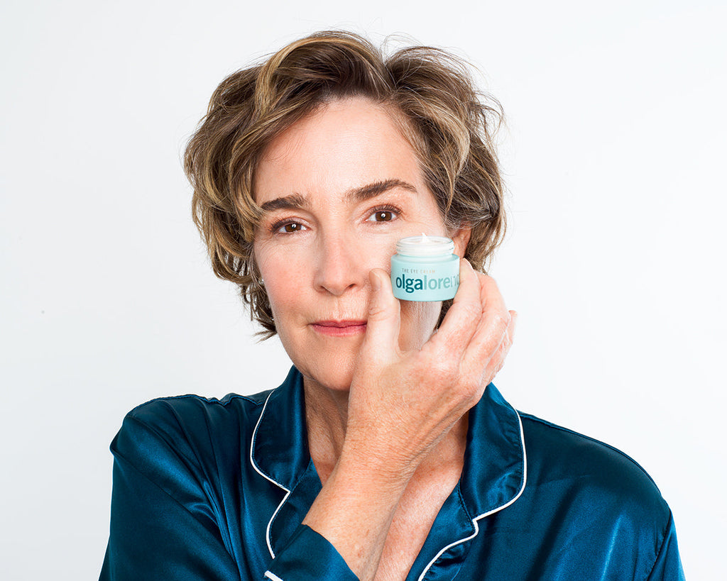 Olga Lorencin Skincare The Eye Cream 0.5 oz jar with Master Blend peptide and niacinamide formula on a neutral background