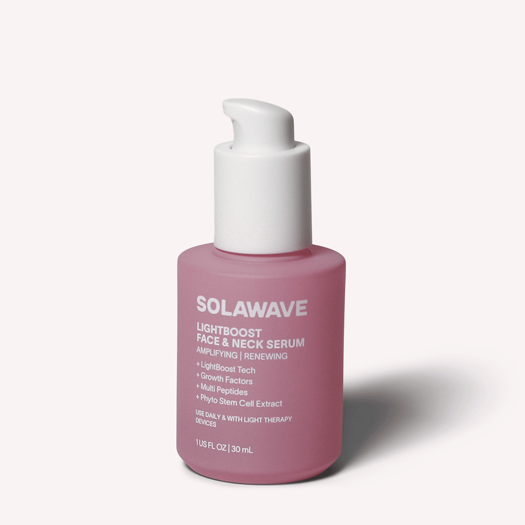 Solawave LightBoost Face and Neck Serum bottle with lightweight peptide and growth factor formula on a clean surface