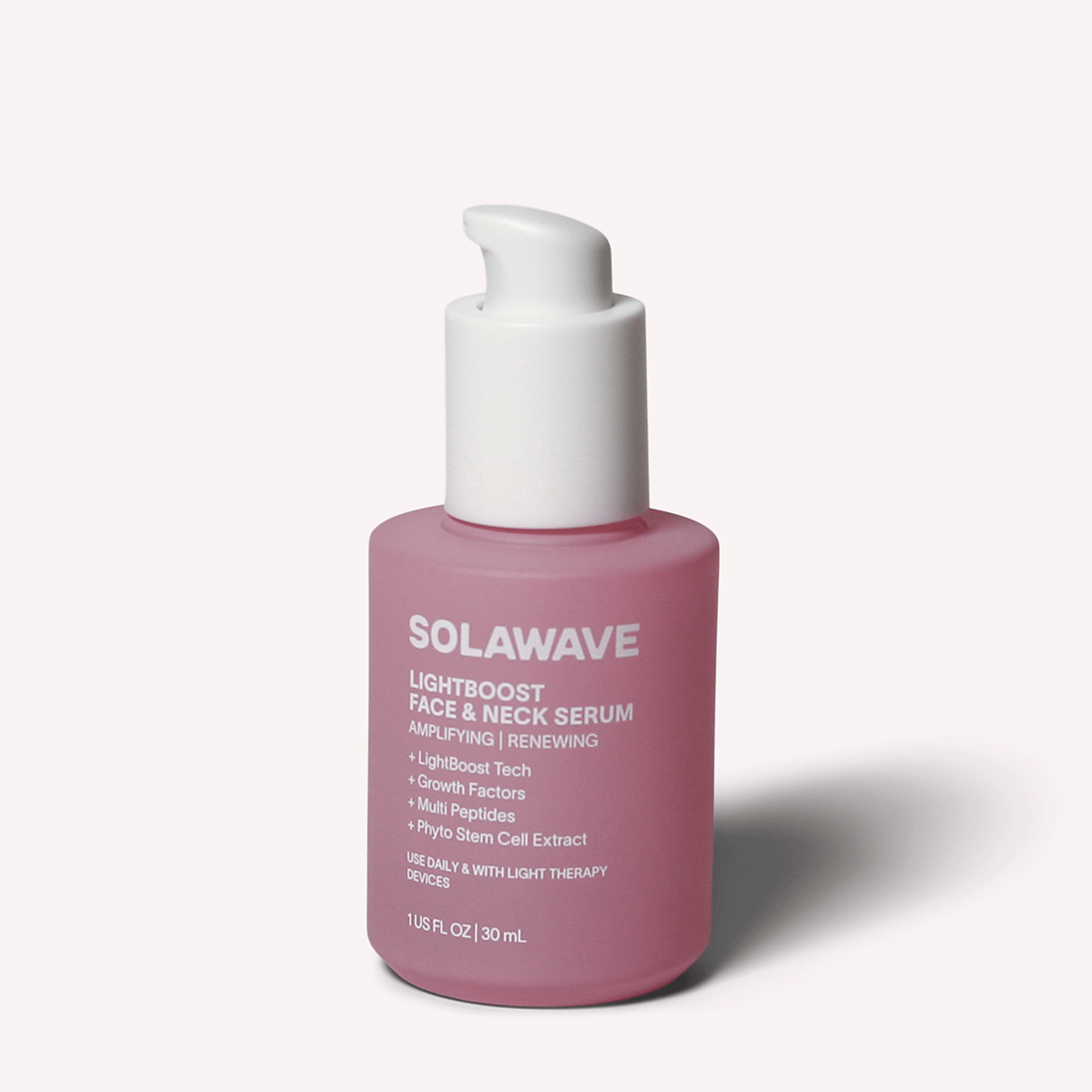 Solawave LightBoost Face and Neck Serum bottle with lightweight peptide and growth factor formula on a clean surface