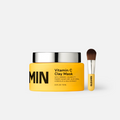 Vitamin C clay mask in jar with turmeric-toned formula, shown with Australian botanical ingredients on a clean white surface