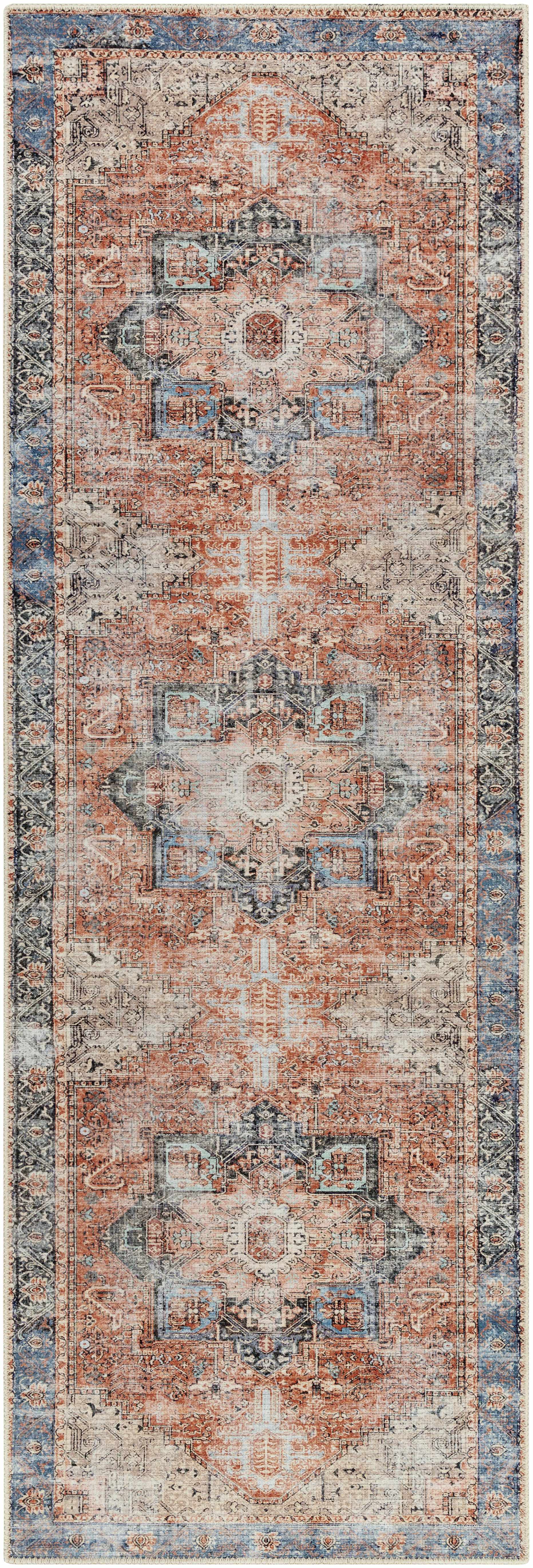 Rosman distressed flat weave area rug in warm red, blue, and earthy tones with vintage-inspired pattern