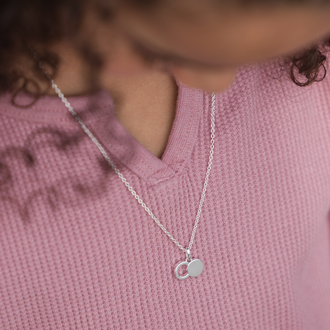 Sterling silver empty tomb pendant necklace with two-circle infinity silhouette on a delicate 19.5-inch chain