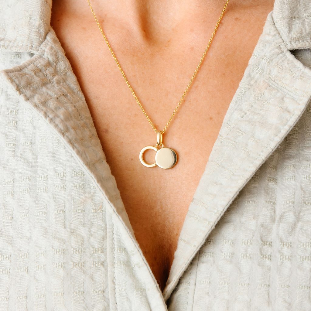 Sterling silver empty tomb pendant necklace with two-circle infinity silhouette on a delicate 19.5-inch chain