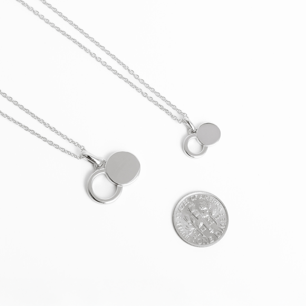 Sterling silver empty tomb pendant necklace with two-circle infinity silhouette on a delicate 19.5-inch chain