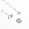 Sterling silver empty tomb pendant necklace with two-circle infinity silhouette on a delicate 19.5-inch chain